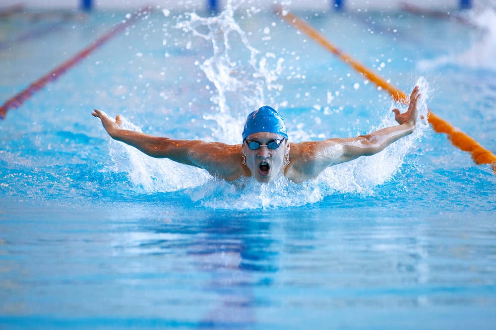 Male Professional Competitive Swimmer In Swimming Pool