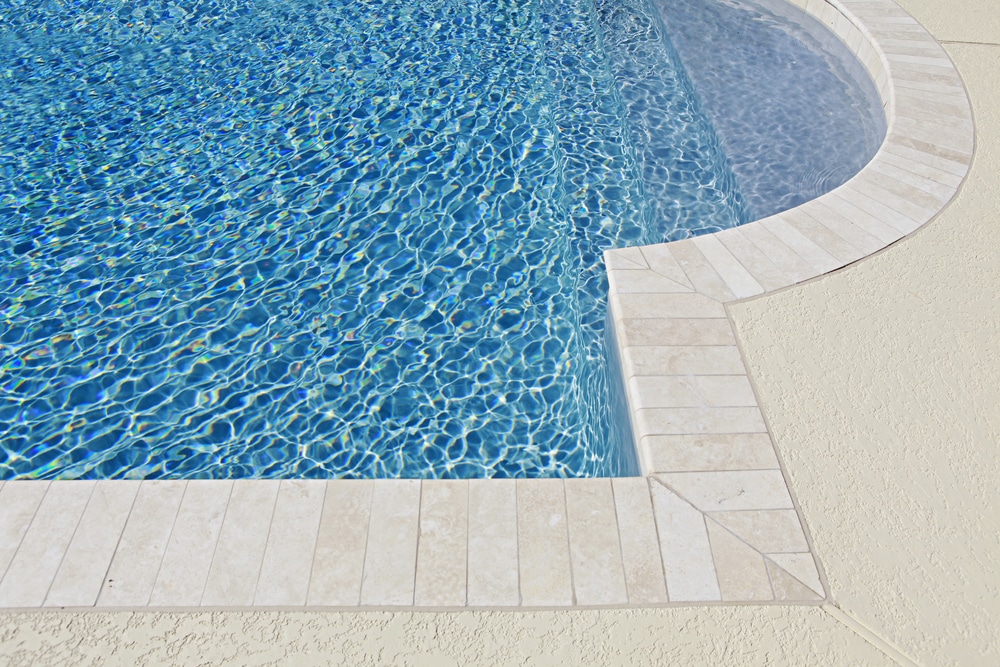 Tile coping around a pool 